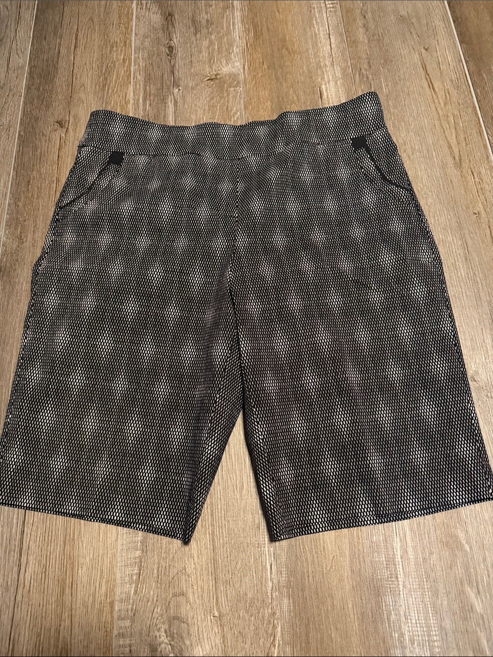 EP Pro brand pull-on Bermuda shorts featuring a black and white geometric